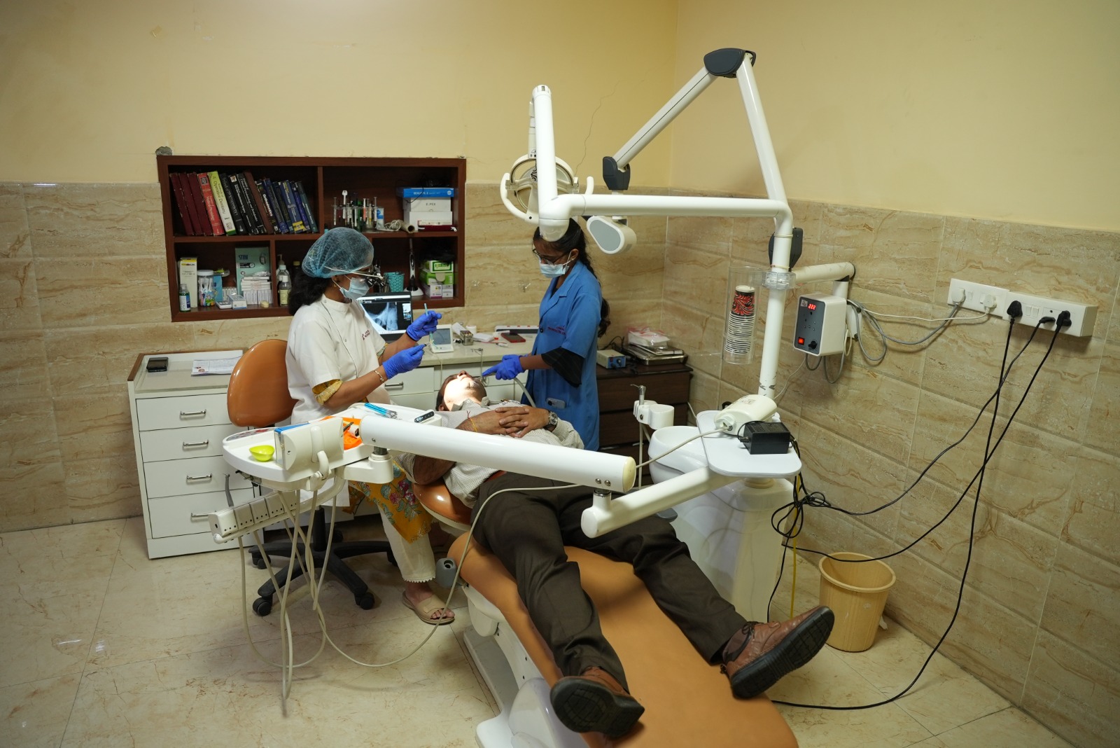 Wide view of the modern dental operatory room and patient chair unit